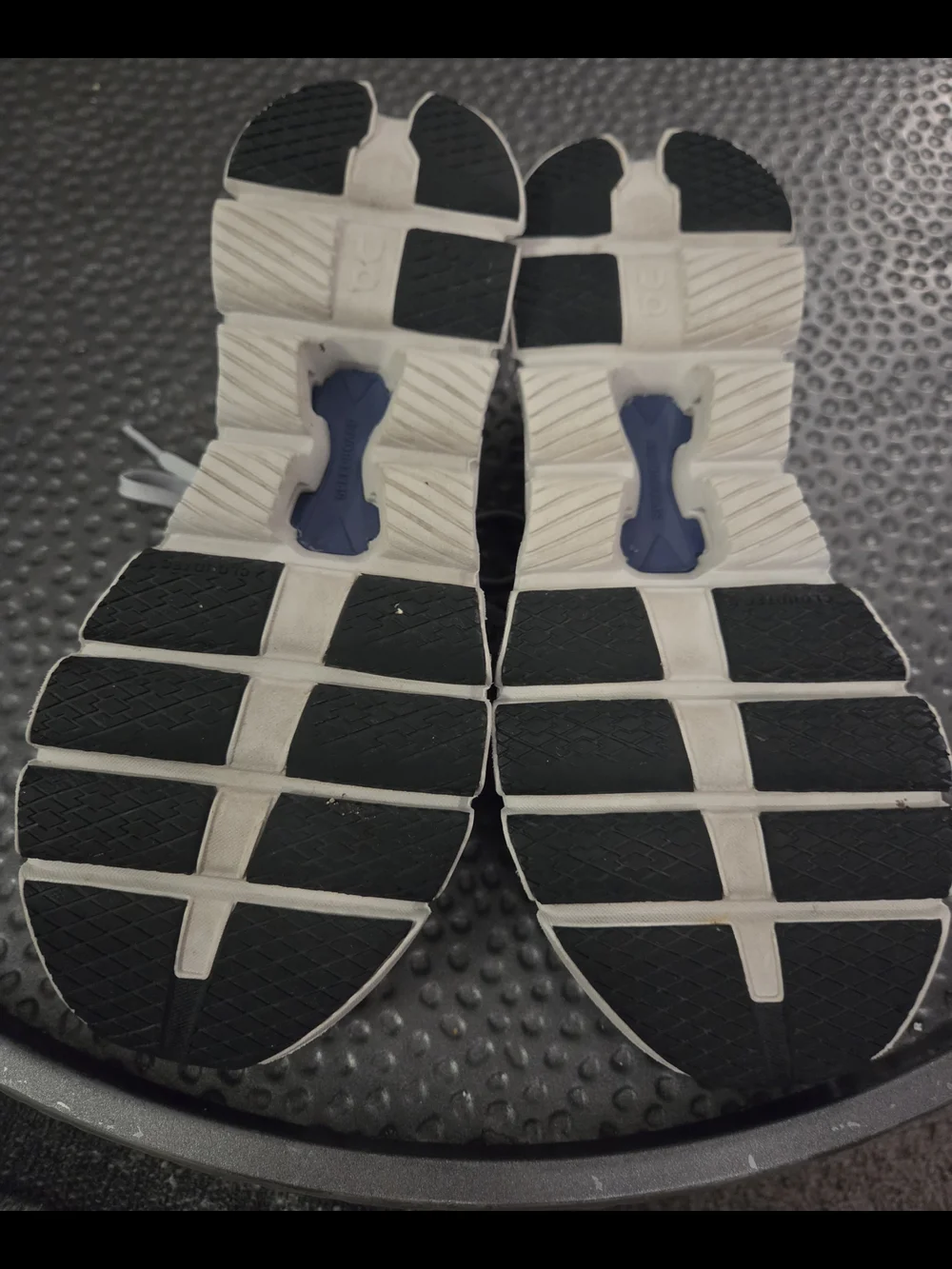On Running Sneakers in Light Gray with Navy Tongue Accents